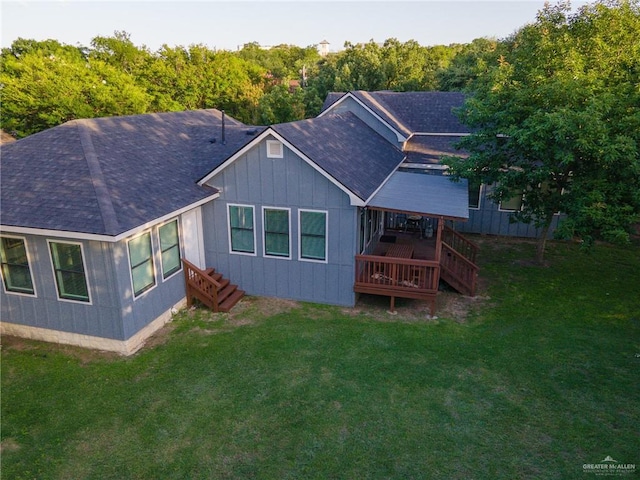 136 W Evergreen St, Boerne, TX 78006 - rear view of property with roof with shingles, a deck, a lawn, and board and batten siding