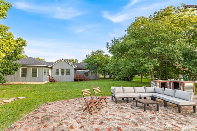 136 W Evergreen St, Boerne, TX 78006 - view of patio / terrace with an outdoor living space, an outdoor structure, and a wooden deck
