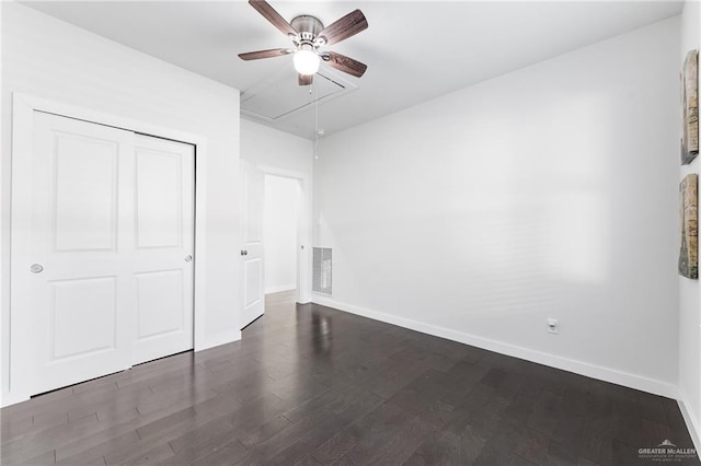 136 W Evergreen St, Boerne, TX 78006 - unfurnished bedroom featuring attic access, wood finished floors, and a ceiling fan