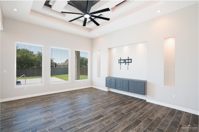 13809 N 37th St, Mcallen, TX 78504 - spare room featuring a tray ceiling, dark wood-style floors, a ceiling fan, baseboards, and recessed lighting