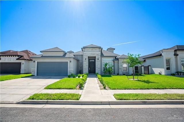 13809 N 37th St, Mcallen, TX 78504 - prairie-style home featuring a front yard, an attached garage, concrete driveway, and stone siding