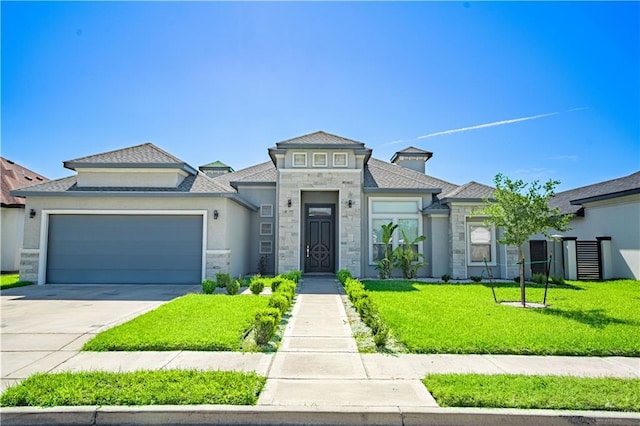 13809 N 37th St, Mcallen, TX 78504 - prairie-style house with stone siding, a front lawn, a garage, concrete driveway, and roof with shingles