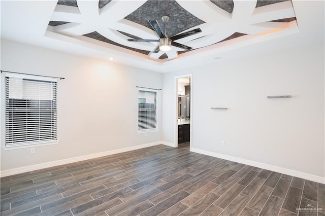 13809 N 37th St, Mcallen, TX 78504 - unfurnished room featuring coffered ceiling, a raised ceiling, dark wood-style flooring, baseboards, and ceiling fan