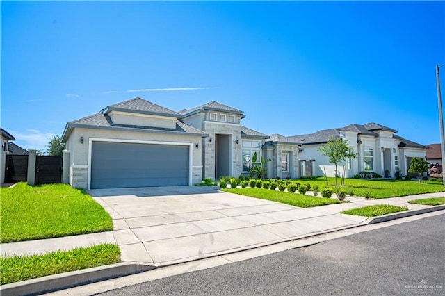13809 N 37th St, Mcallen, TX 78504 - prairie-style home with concrete driveway, a garage, a front lawn, stucco siding, and stone siding