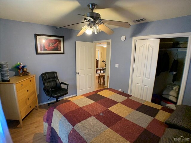 14022 Whitewing Ln, Lyford, TX 78569 - bedroom featuring a closet, light wood-style flooring, and a ceiling fan