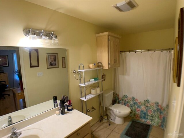 14022 Whitewing Ln, Lyford, TX 78569 - bathroom with tile patterned flooring, toilet, curtained shower, and vanity