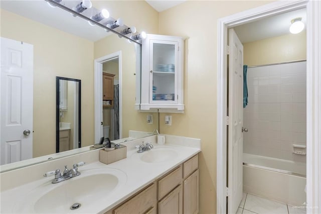 bathroom with tile patterned floors, vanity, and bathtub / shower combination