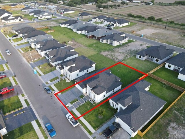 1101 Magnolia St, Mission, TX 78573 - aerial perspective of suburban area with property parcel outlined
