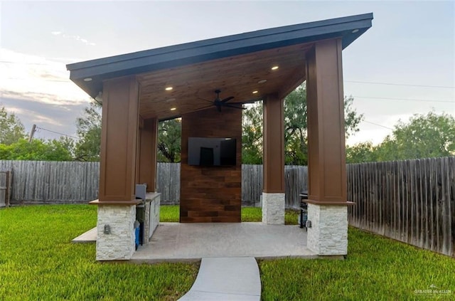 view of patio with a gazebo and ceiling fan