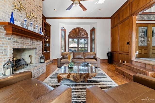 4301 Spring Creek Dr, Corpus Christi, TX 78410 - living area featuring wood finished floors, baseboards, a ceiling fan, and crown molding