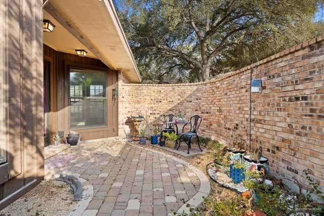 4301 Spring Creek Dr, Corpus Christi, TX 78410 - fenced backyard featuring a patio