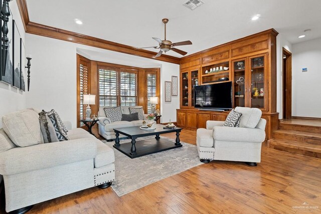 4301 Spring Creek Dr, Corpus Christi, TX 78410 - living area with ornamental molding, ceiling fan, wood finished floors, and recessed lighting