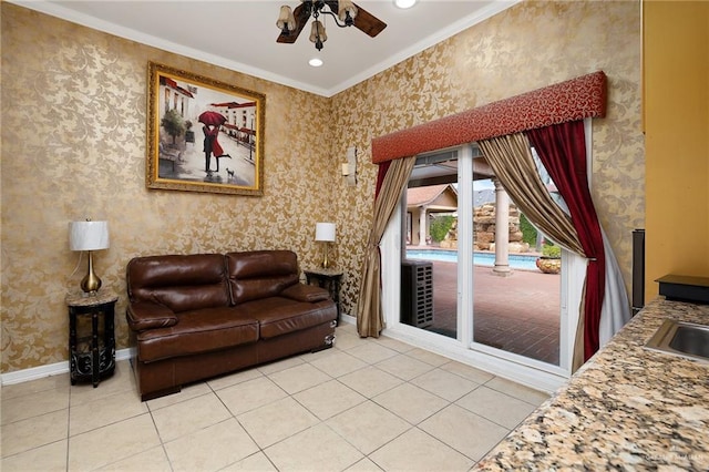 tiled living room featuring ceiling fan and crown molding