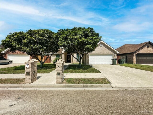 700 Via Cantera Dr, San Juan, TX 78589 - view of front of property featuring concrete driveway