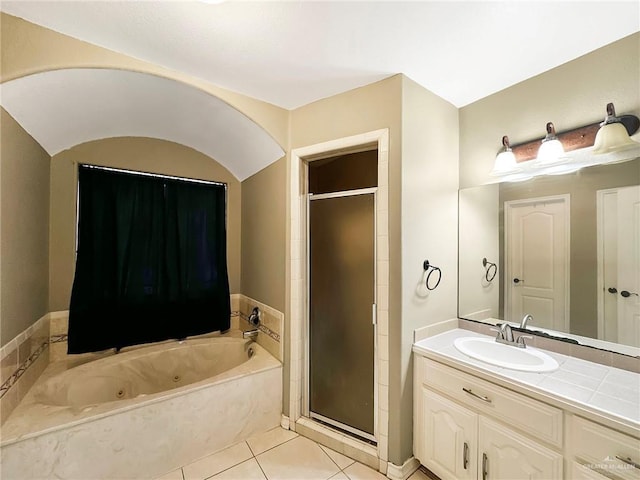 700 Via Cantera Dr, San Juan, TX 78589 - bathroom featuring a jetted tub, vanity, a shower stall, and tile patterned flooring