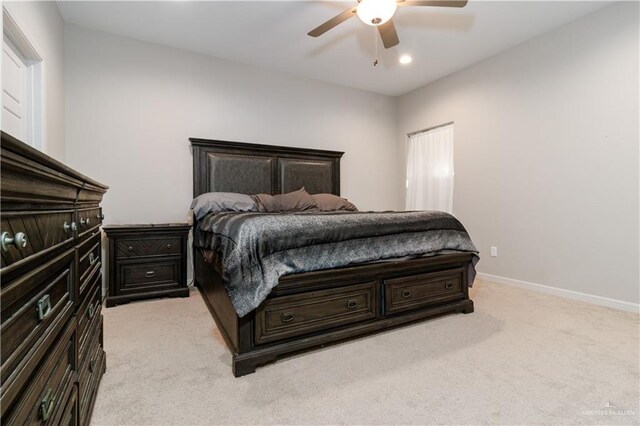 bedroom with light carpet, a ceiling fan, baseboards, and recessed lighting