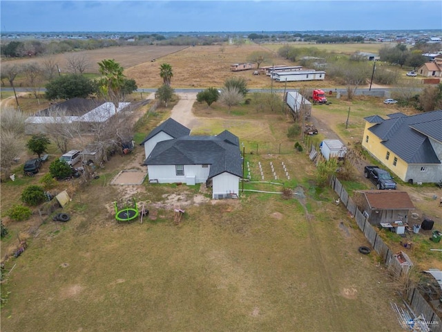 birds eye view of property featuring a rural view