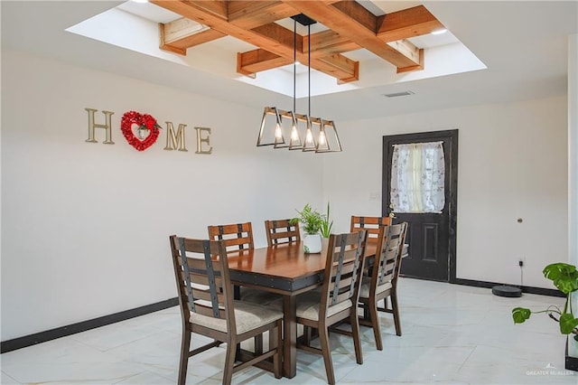 dining room with coffered ceiling