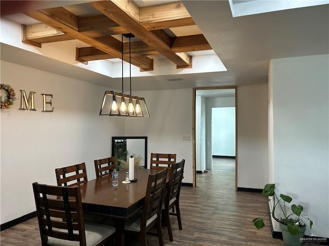 23856 N Val Verde Rd, Edinburg, TX 78542 - dining room with dark wood-style flooring, beamed ceiling, and baseboards