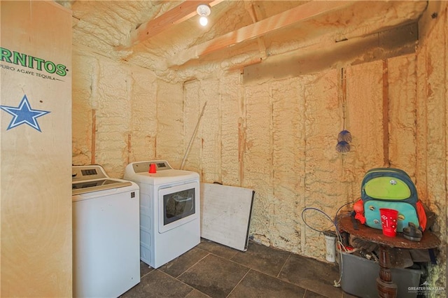 laundry room featuring washing machine and clothes dryer