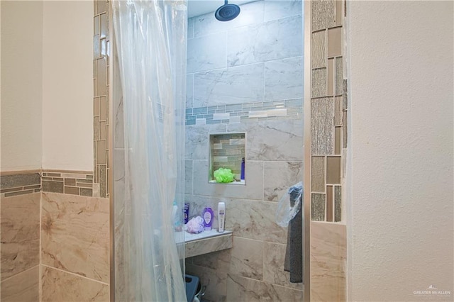 bathroom featuring walk in shower