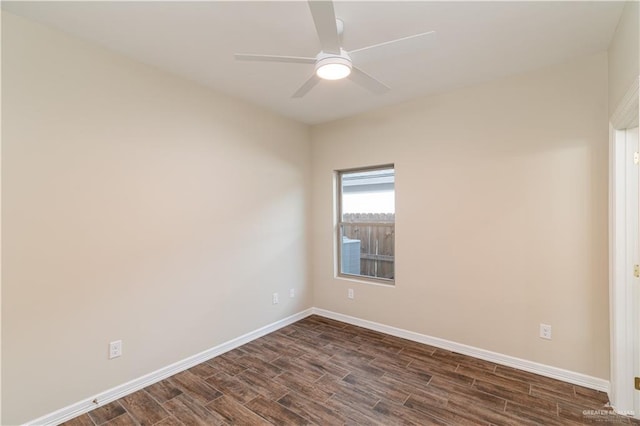 empty room featuring dark hardwood / wood-style flooring and ceiling fan