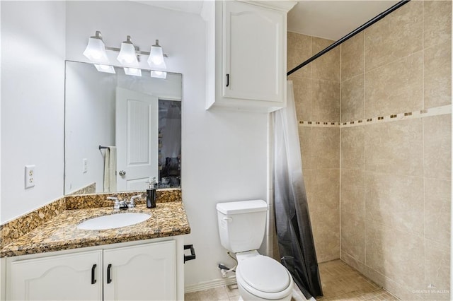 1041 Yellow Hammer St, Rio Grande City, TX 78582 - bathroom with a tile shower, toilet, and vanity