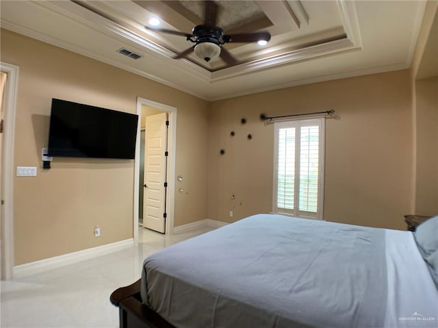 bedroom featuring visible vents, ornamental molding, a ceiling fan, and a tray ceiling