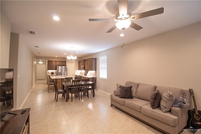 3413 Emory Ave, Mcallen, TX 78504 - living area featuring baseboards, a chandelier, recessed lighting, a ceiling fan, and light tile patterned floors