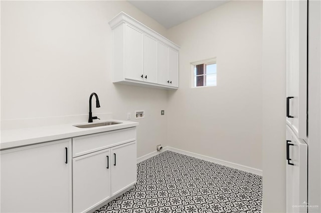 laundry room with washer hookup, hookup for an electric dryer, cabinets, and sink