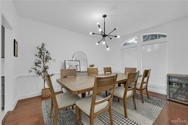 2800 Santa Lydia St, Mission, TX 78572 - dining area with a chandelier, wood finished floors, and vaulted ceiling