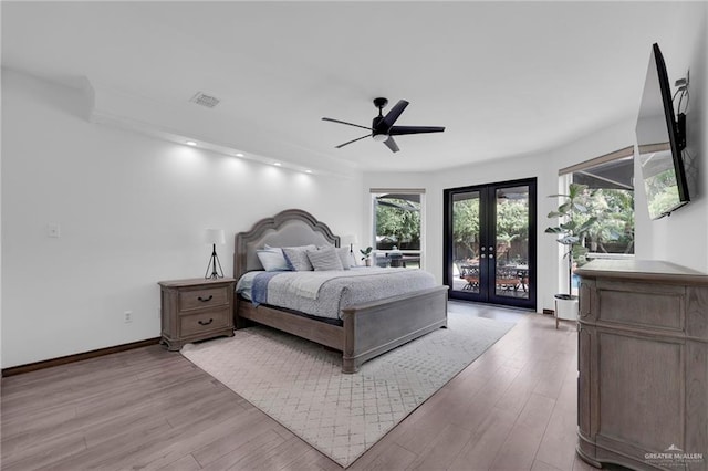 2800 Santa Lydia St, Mission, TX 78572 - bedroom featuring access to exterior, french doors, light wood-style floors, baseboards, and recessed lighting