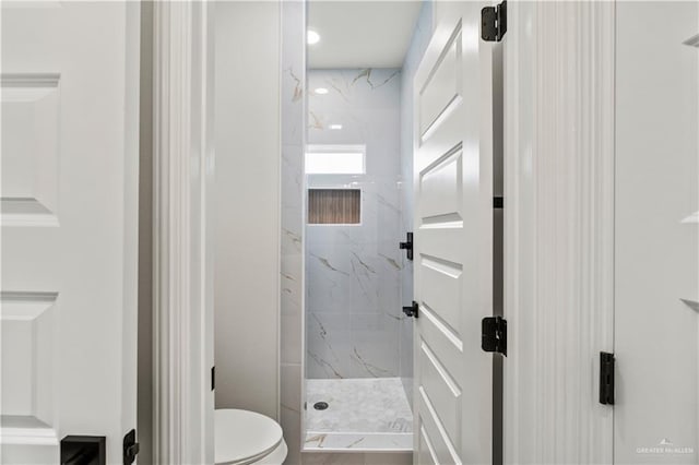 1114 Knotty Pine Ln, Harlingen, TX 78552 - full bathroom featuring a marble finish shower and toilet
