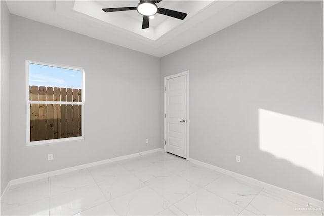 spare room with ceiling fan