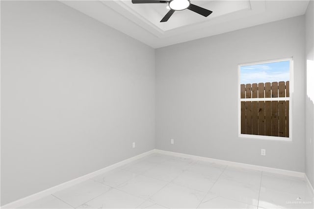 spare room with ceiling fan