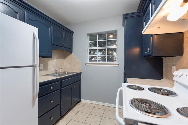 kitchen with blue cabinetry, tasteful backsplash, range hood, and white appliances