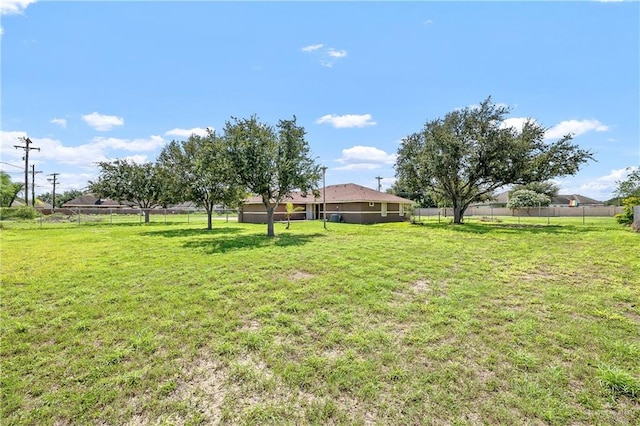 view of yard with a rural view