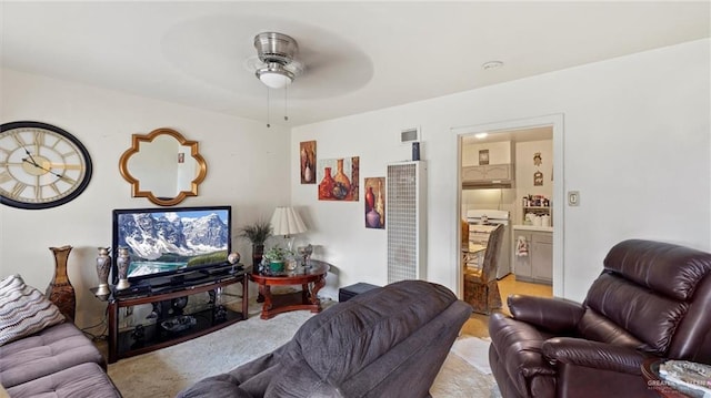 living room featuring ceiling fan