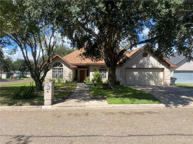 single story home featuring a garage