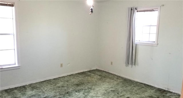 empty room featuring carpet