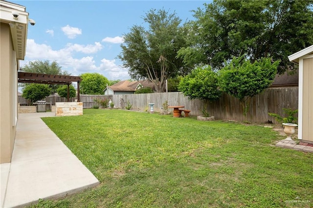 view of yard featuring a fenced backyard, a patio area, and a pergola
