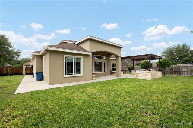 back of property featuring a patio, a pergola, a fenced backyard, a lawn, and stucco siding