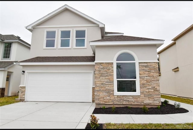 view of front of property featuring a garage