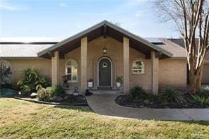 view of front of home with a front lawn