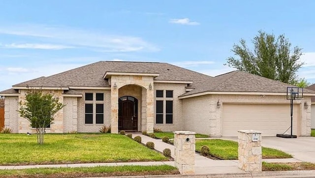 view of front of property featuring a front lawn, roof with shingles, brick siding, an attached garage, and driveway