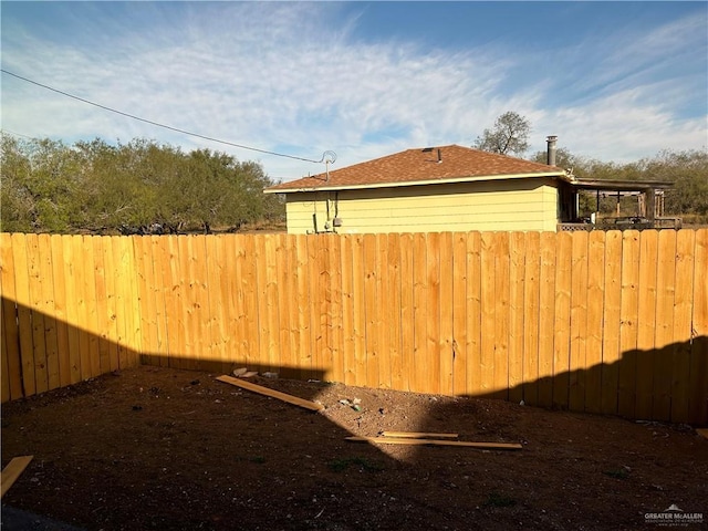 view of yard with fence