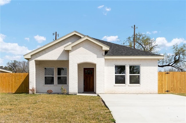 view of front of home with a front yard