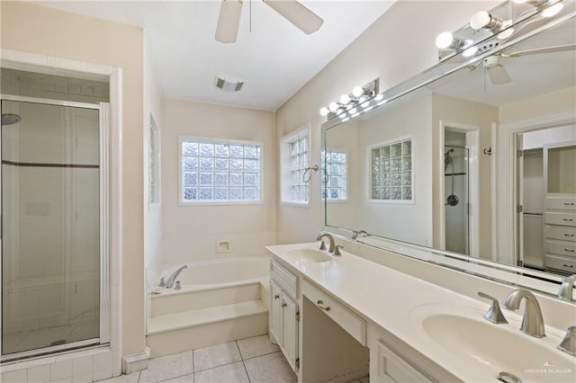 bathroom with tile patterned flooring, vanity, ceiling fan, and independent shower and bath