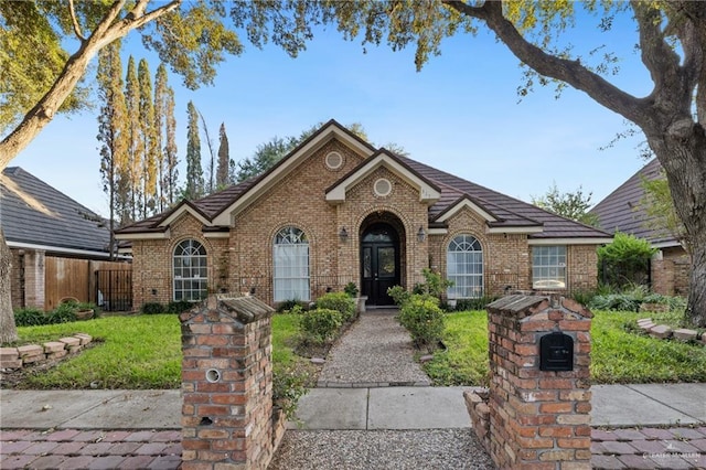 view of front of home with a front lawn