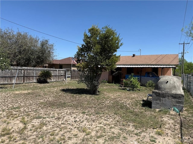 view of yard with fence